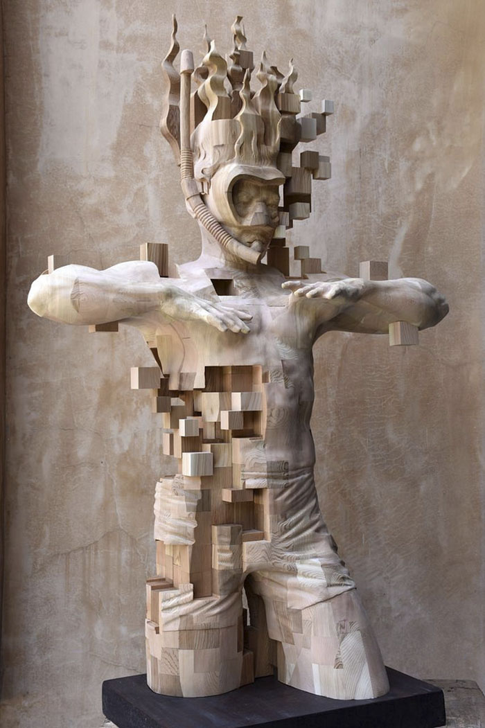 These Pixelated Sculptures That Look Like Computer Glitches Are Actually Made From Wood