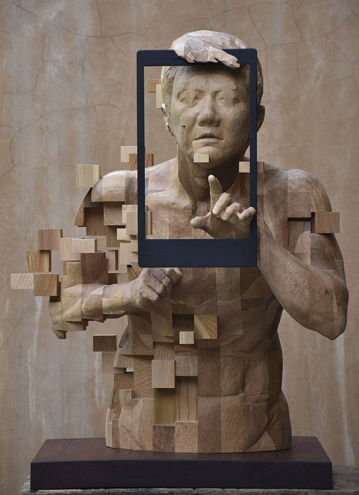 These Pixelated Sculptures That Look Like Computer Glitches Are Actually Made From Wood