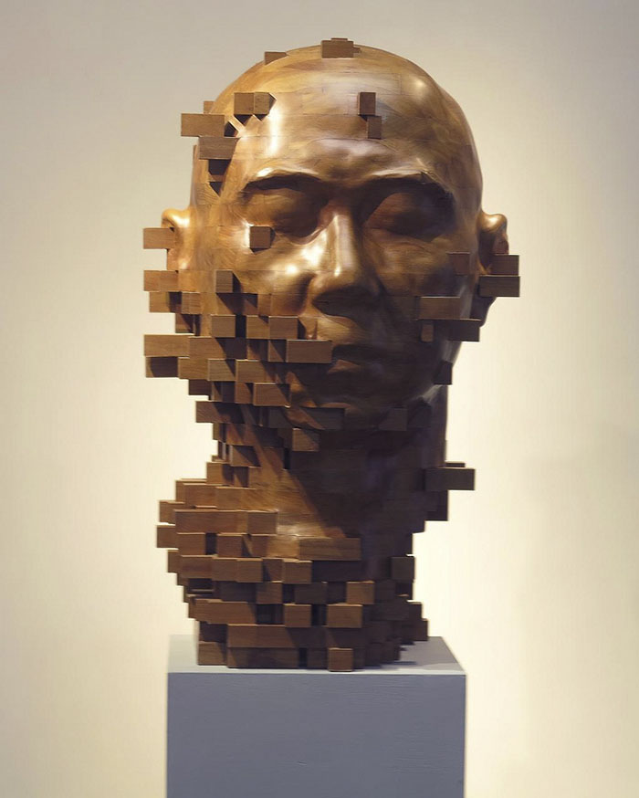 These Pixelated Sculptures That Look Like Computer Glitches Are Actually Made From Wood