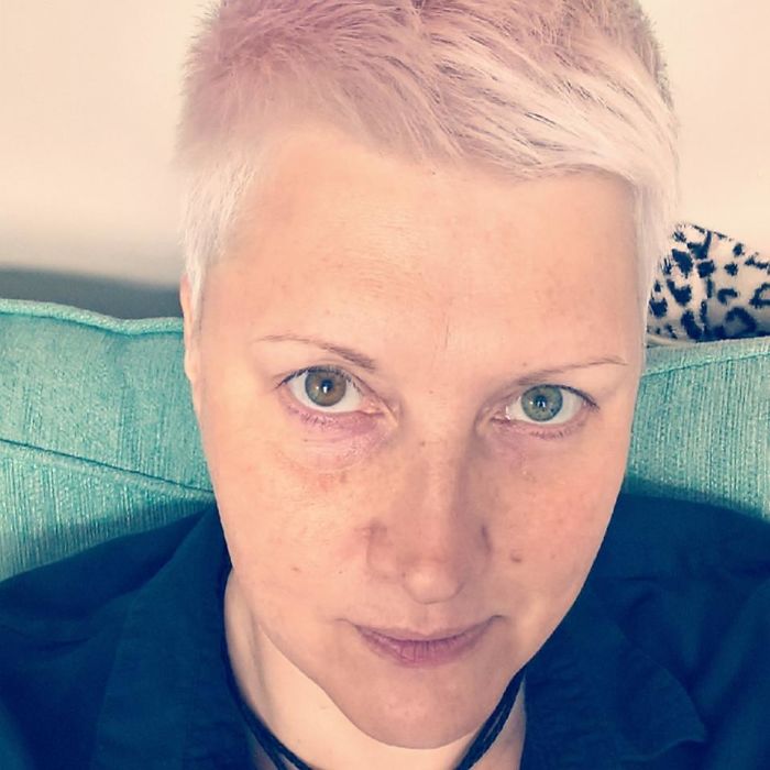 Close-up of a person with short hair, wearing a dark shirt, illustrating that depression symptoms have no face.