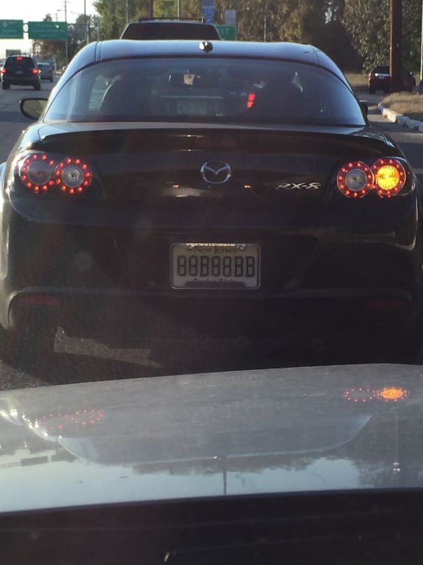 car with "8888888" car plates 