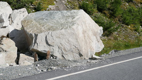 boots under the rock on the highway 