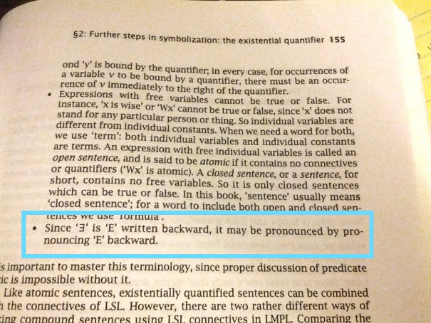 backward written "E" 