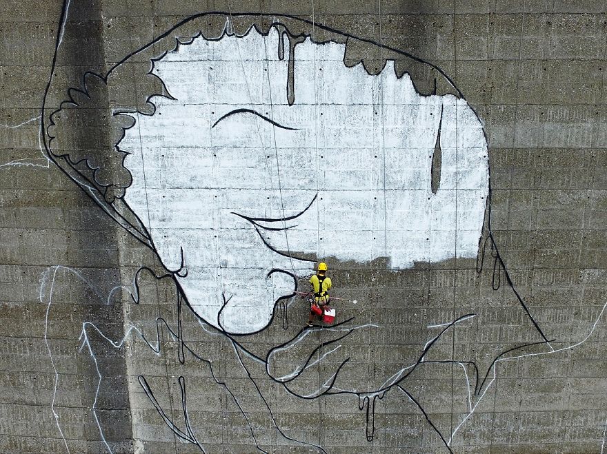 Artists Made A Mural On An Abandoned Dam To Represent Refugees In France Artists Made A Mural On An Abandoned Dam To Represent Refugees In France