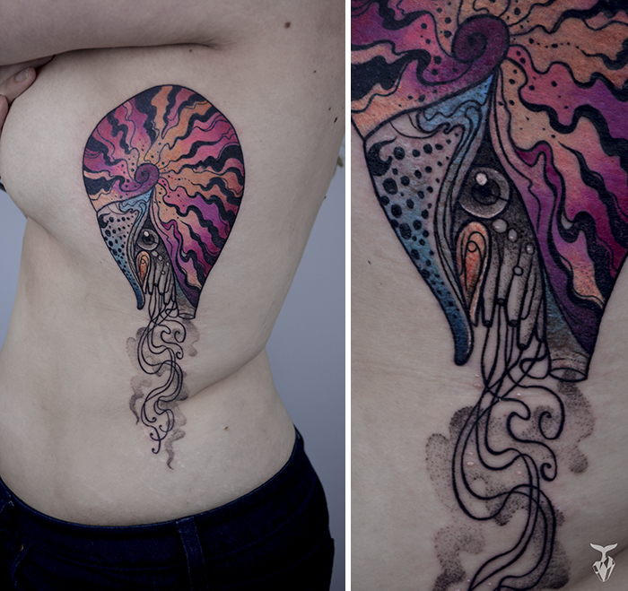 Nature and Art Nouveau inspired tattoo featuring vibrant colors and abstract shapes on a person's side.