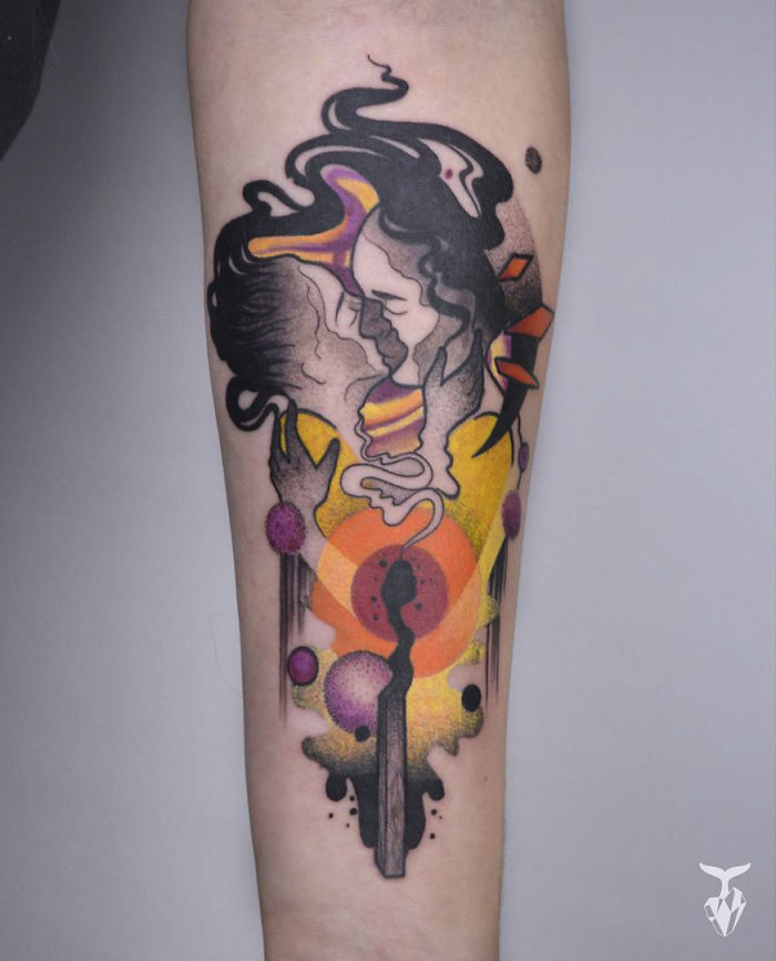 Nature and Art Nouveau inspired tattoo with abstract shapes and colorful designs on an arm.