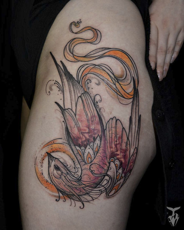 Nature and Art Nouveau inspired tattoo featuring flowing lines and floral elements on a person's thigh.