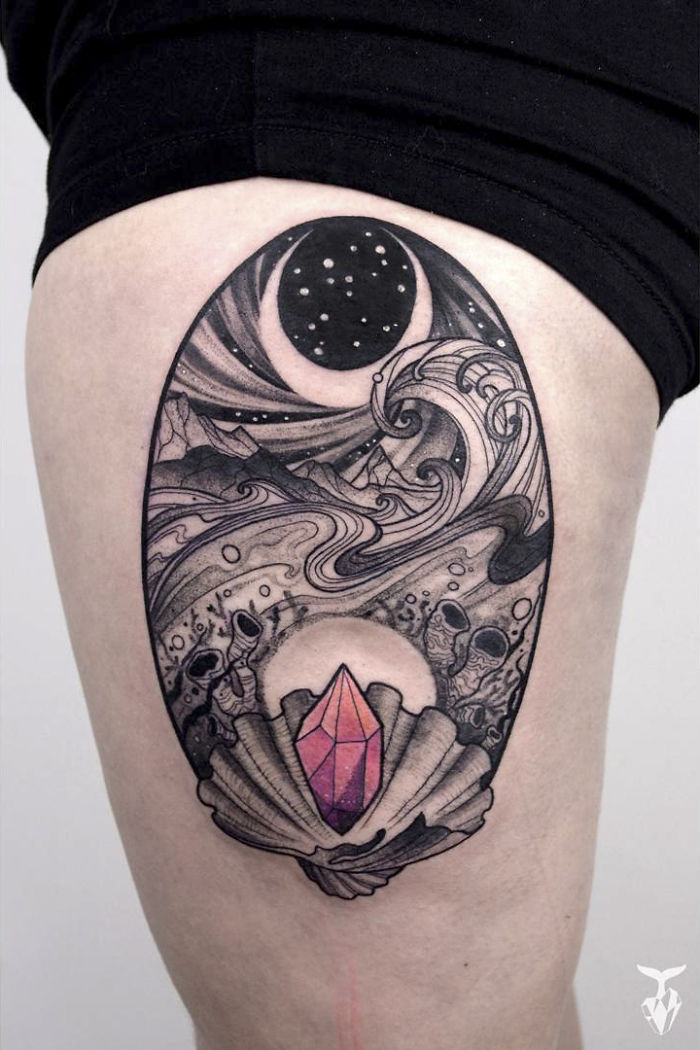 Nature and Art Nouveau inspired tattoo of a crescent moon and crystal seashell design on leg.
