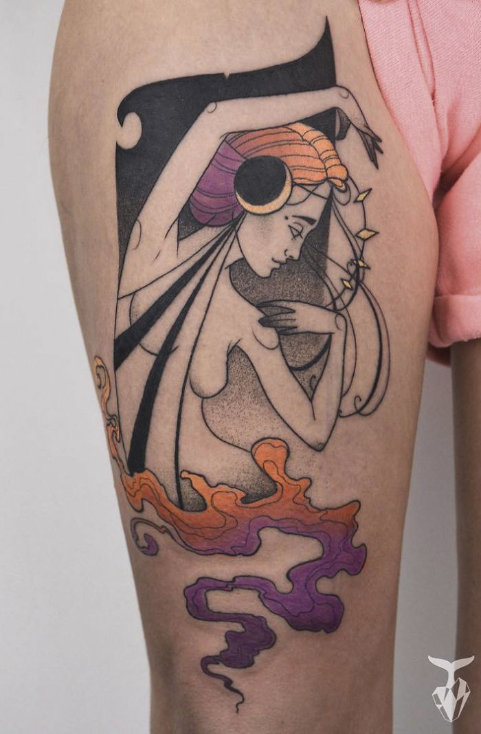 Art Nouveau inspired tattoo featuring a stylized woman with colorful, flowing lines on a person's arm.
