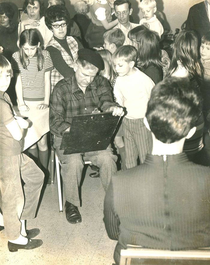 Same Dad, Different Kind Of Cool, Different Crowd: Portrait Artist Paul In A Portrait Session. I Always Looked Forward To Camping Trips With Dad Who Was Often Invited To Participate In And Judge Art Fairs In The Midwest. Groups Of Silent, Admiring Onlookers Were Common