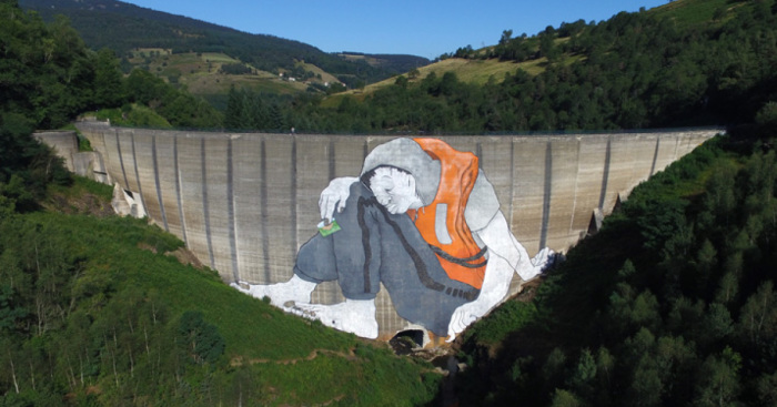 Artists Made A Mural On An Abandoned Dam To Represent Refugees In France