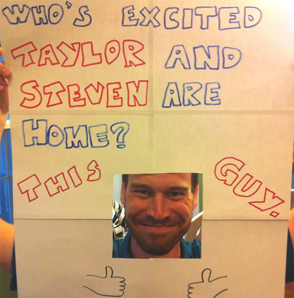 Funny airport pickup sign with photo cutout and text asking who's excited for Taylor and Steven's arrival.