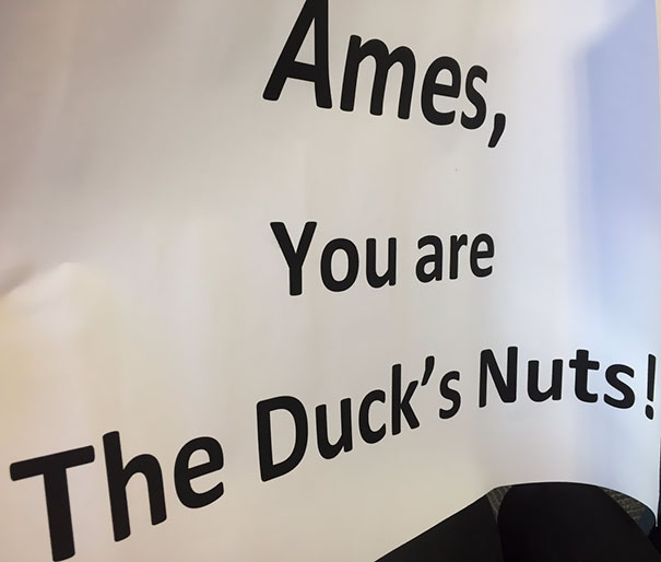 Funny airport pickup sign saying "Ames, You are The Duck's Nuts!"