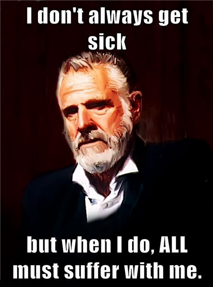 Meme of a bearded man with text about husbands getting sick and making others suffer.