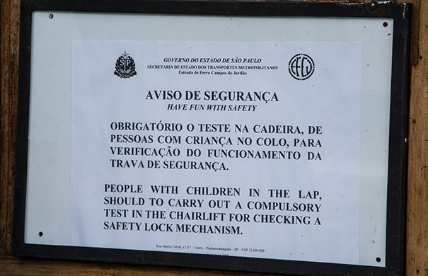 Failed translated sign about chairlift and kids 