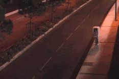 man dressed up as a speed limit camera 