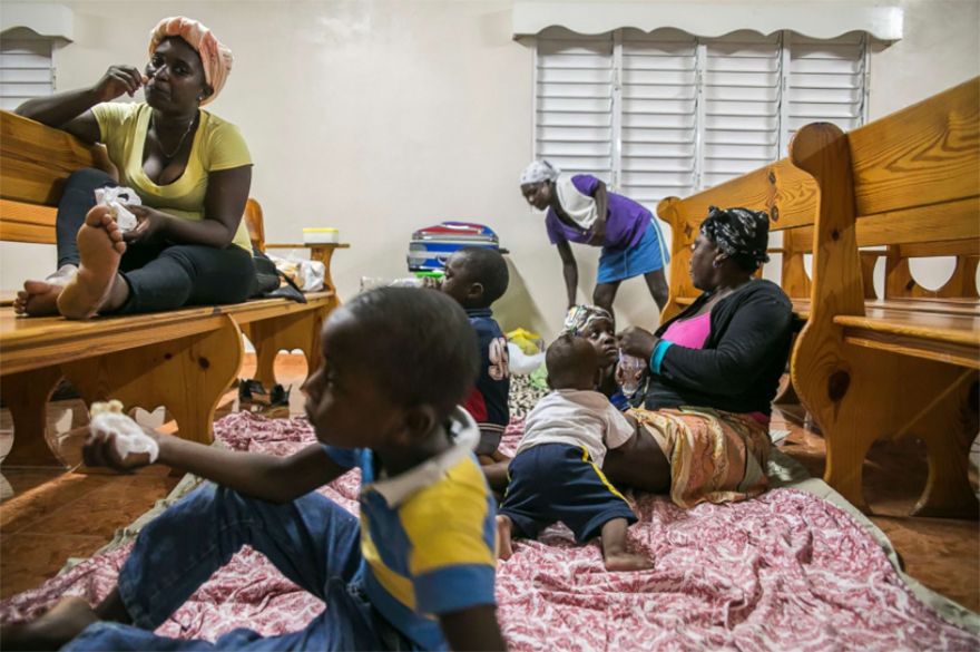 Families Gather At A Shelter In A Local Church During The Evening Before The Arrival Of Hurricane Irma In Las Terrenas, Dominican Republic