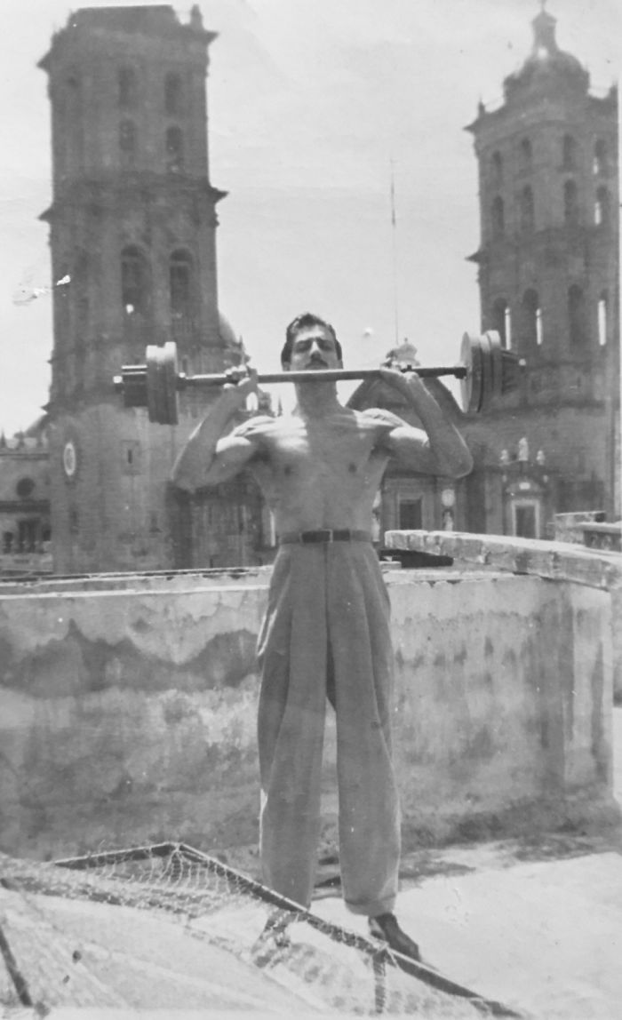 My Grand Dad Lifting Weights On His Roof Top At The Age Of 23.