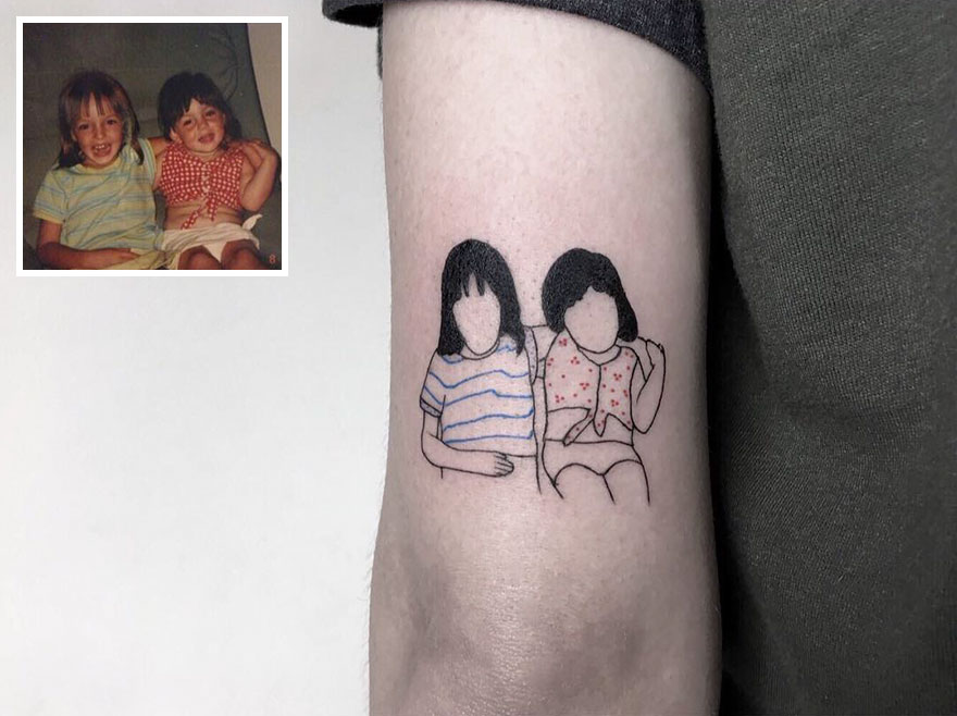 Stylish tattoo of nostalgic childhood photo on arm, featuring two children in striped and polka dot shirts.