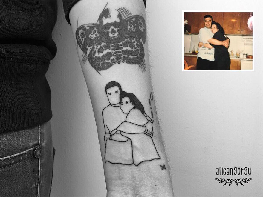 Tattoo of nostalgic childhood photo on forearm, featuring two people hugging, with original photo inset in the corner.