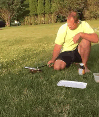 Gunpowder Shooting Up Out Of A Miniature Cannon Lands Directly In A Container Of Gunpowder