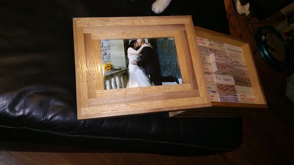 At Our Wedding, In Lieu Of A Guestbook, We Had Our Guests Sign Jenga Blocks. For Our First Anniversary, He Hand Made A Box Made Of 190 Pieces Of Wood Resembling Jenga Pieces To Keep All The Pieces In.