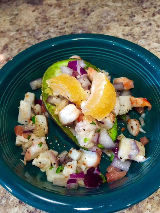 After My Wife Gets Back From Christmas Shopping She Can Have The Snack I Made Her. Maine Lobster, Scallops, Shrimp, And Fish Ceviche In An Avacado With Tangerine Slices For Garnish.