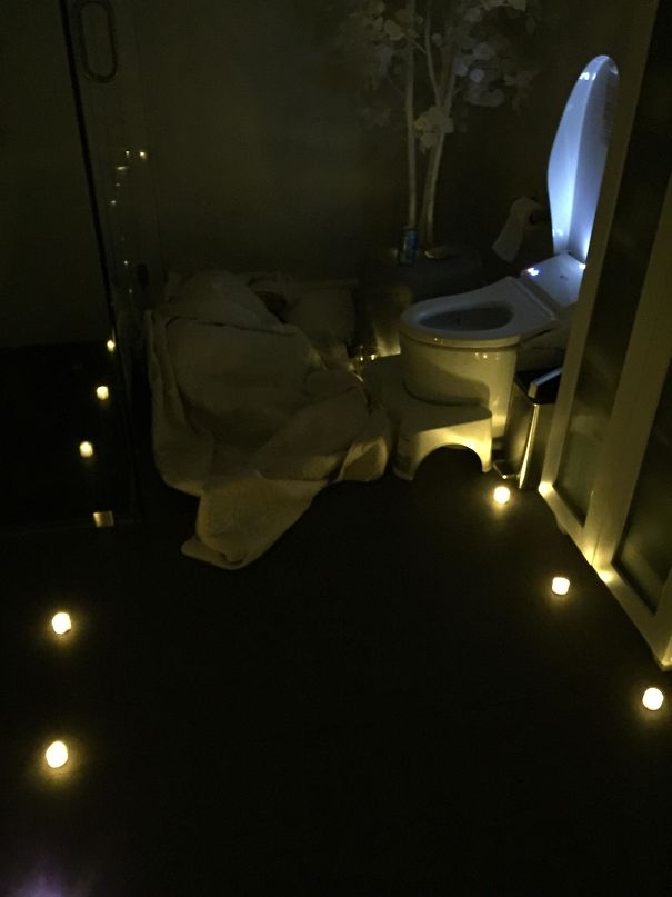 Wife Had A Bit To Much To Drink So I Made A Nice Romantic Candle Setting For Her With Pillow And Blankets By The Ivory Throne Complete With Hair Rubber Band, Water, Socks, And Nose Spray. I'm Going To Sleep, Candles Are Battery Operated