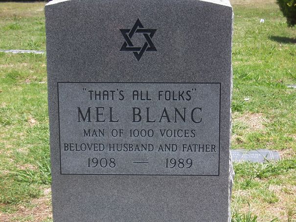 Tombstone with humorous inscription "That's all folks," honoring Mel Blanc, showcasing funny tombstones by people with undying humor.
