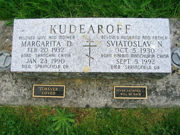 Tombstone of Margarita and Sviatoslav with funny plaque reading never satisfied will be back, showcasing undying humor.