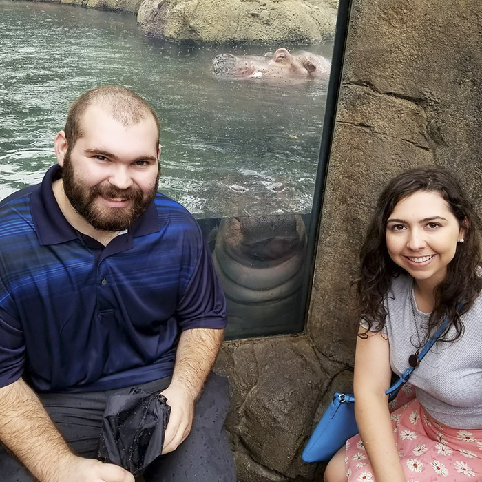 Fiona The Hippo Photobombs Couple’s Engagement Pics, And Now They’re So Much Better Fiona The Hippo Photobombs Couple’s Engagement Pics, And Now They’re So Much Better