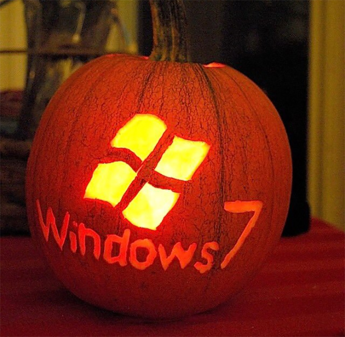 Carved pumpkin with Windows 7 logo glowing in the dark for Halloween.
