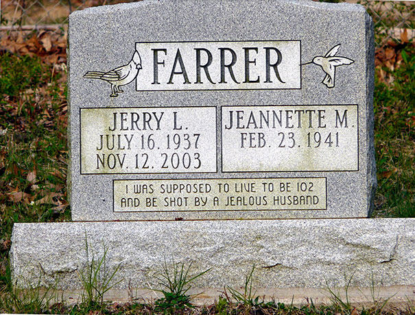 Tombstone with funny epitaph about living to 102 and being shot by a jealous husband, showcasing undying humor.