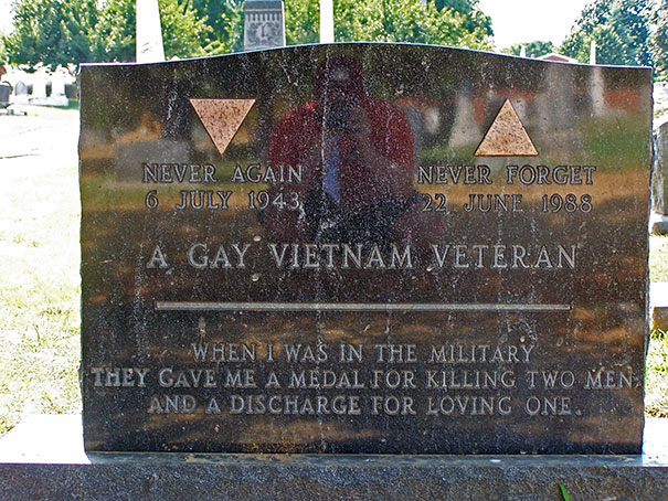Funny tombstone of a gay Vietnam veteran with a humorous engraved message about military service and love.