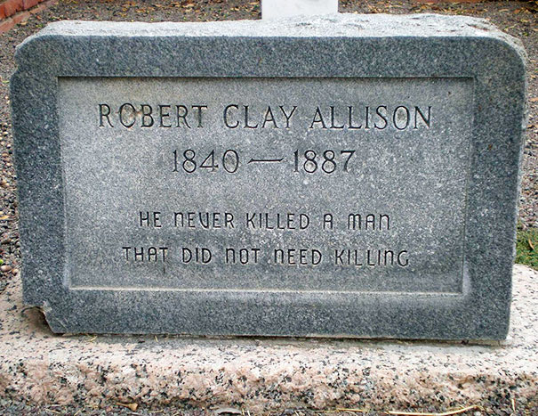 Gray tombstone with an engraved witty epitaph showcasing funny tombstones by people with undying humor.