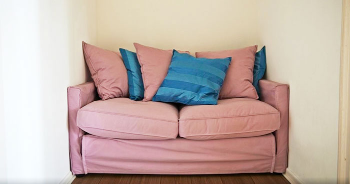 Sofa In The End Of A Hallway