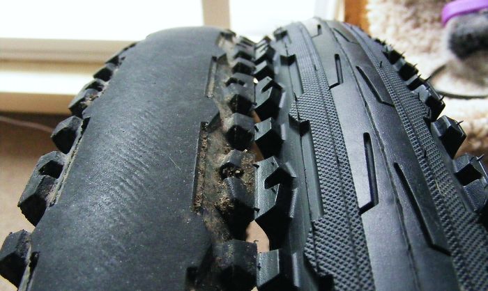 Bicycle Tire After Seven Years And 9,500 Km Versus Its Brand-New Replacement