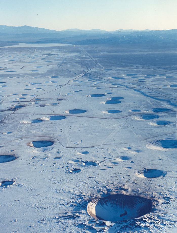 This Is What Nearly 20 Years Of Nuke Testing Did To A Patch Of Desert In Nevada. Only A Small Fraction Was On The Surface, And Over A Thousand Nuclear Detonations Were Carried Out Altogether