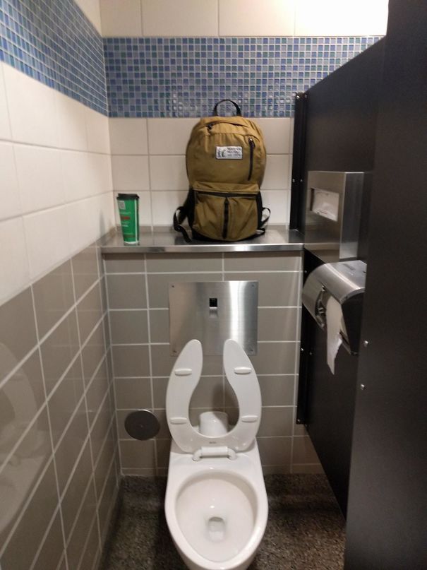 Bathroom Stall With A Shelf In It At The Tulsa Airport
