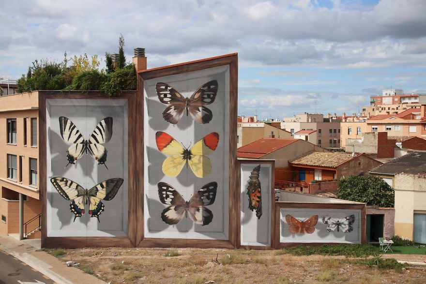 Artist Adds Charm To Boring Streets By Painting Giant Butterfly Murals
