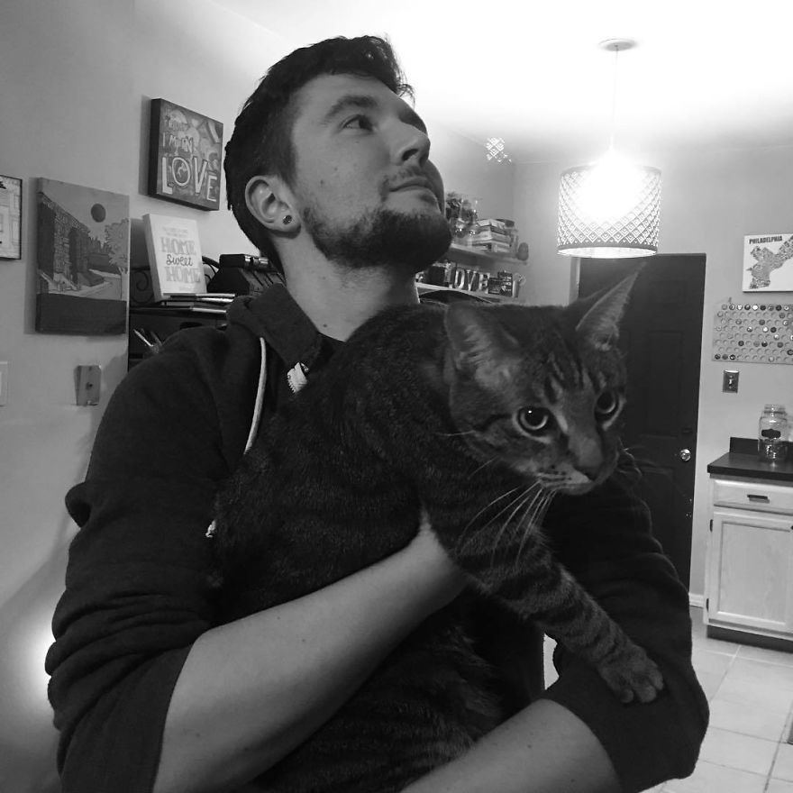 Man Cuddles Cats On Instagram