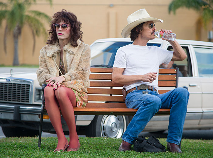 Scene from Dallas Buyers Club movie showing two characters sitting on a bench, capturing key fun facts about movies.
