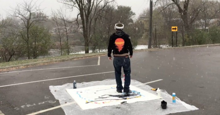 Artist Paints With His Feet While Viewing From An Overhead Drone With A Vr Helmet In A Snowstorm