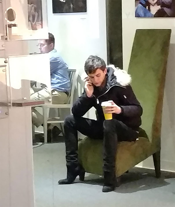 Due To The Chair Leg And This Guy's Posture, It Looks Like He's Wearing High Heels