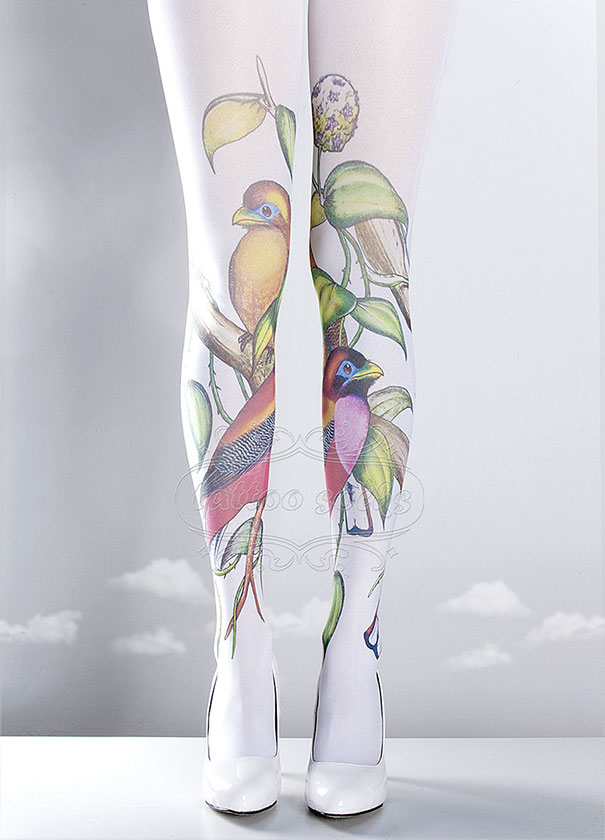 Tattoo socks with vibrant bird designs on white stockings, offering a non-permanent tattoo look.