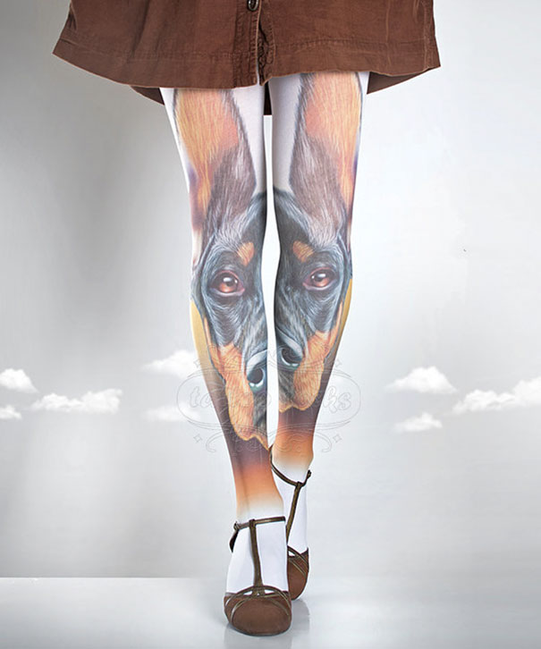 Tattoo socks with a realistic dog design, worn with brown shoes and a skirt.