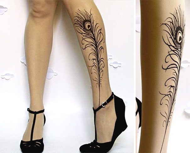 Tattoo socks with peacock feather design on legs wearing black heels, ideal for tattoo lovers without long-term commitment.