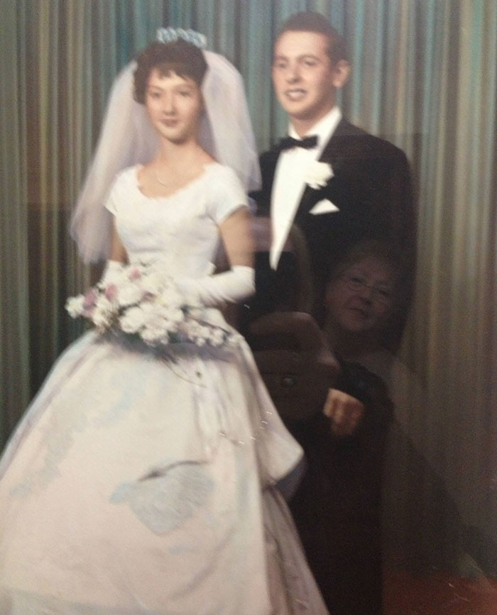 I Was Taking A Photo Of My Boyfriend's Grandparents' Wedding Photo Because I Thought It Was Awesome, And Accidentally Caught The Reflection Of His Grandmother Admiring It, 50 Years Later. I Love This Photo