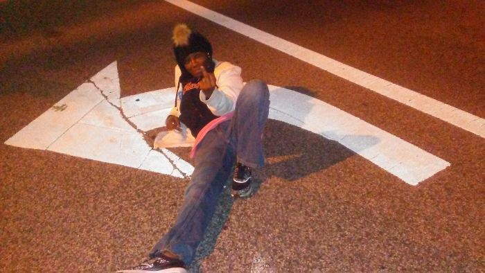 She Said She Was Challenged To Lay In These Streetz...crazy Cars Were Coming Towards Her Too