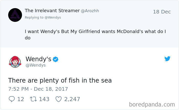 Twitter roast by Wendy's responding to a user asking about girlfriend preferences in fast food, suggesting many options.